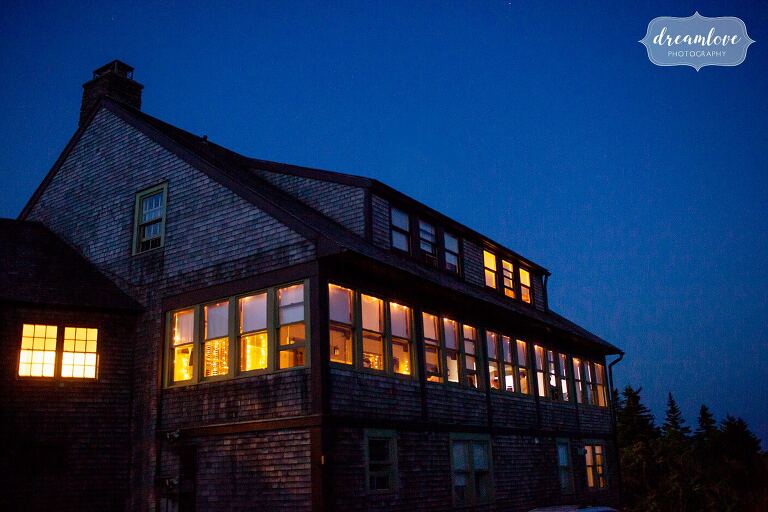 Bascom Lodge wedding venue is pictured in the blue light twilight on top of Mt. Greylock.