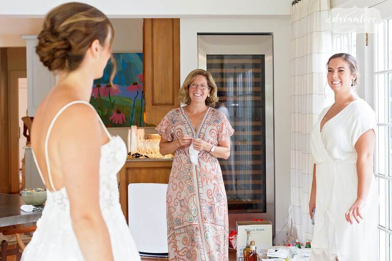Mother of the bride smiles at her daughter at this Woodway Beach Club wedding.