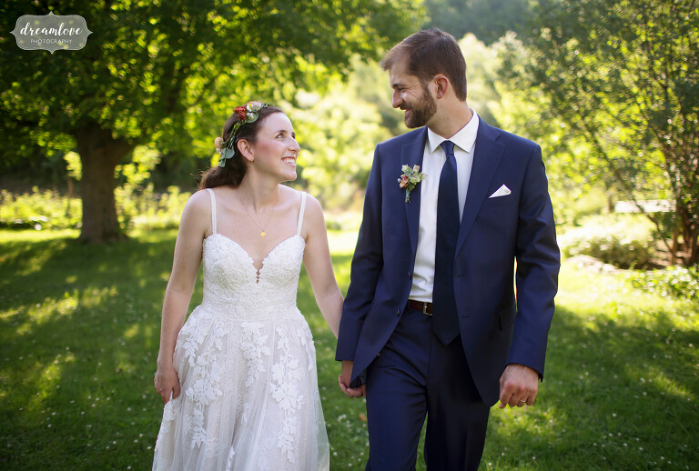 Bride and groom smiling at the Cricket Creek Farm wedding venue in western MA.