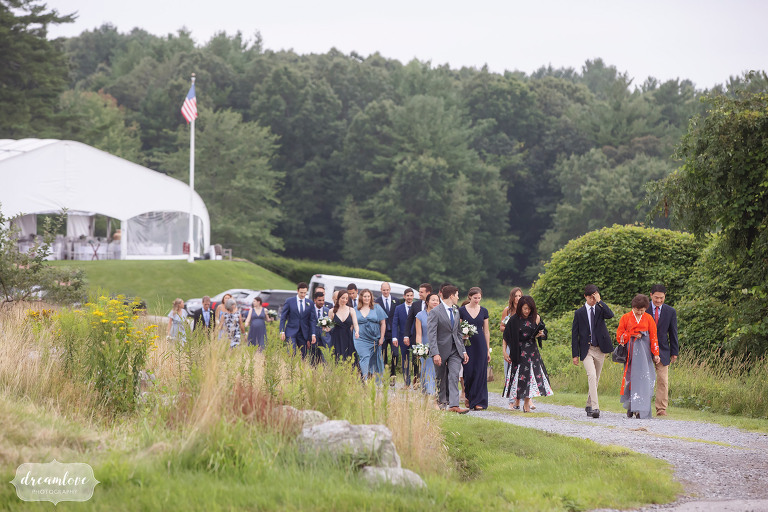 Guests walk to to the outdoor ceremony at Fruitlands Museum.