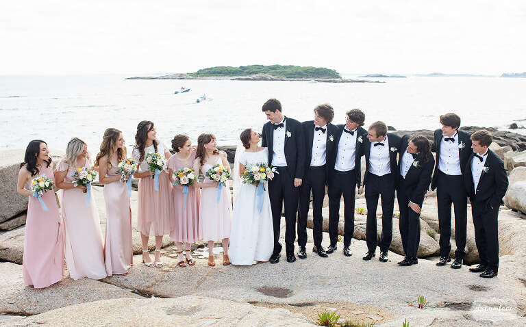 Wedding party on the rocks of Magnolia Beach in Gloucester, MA.