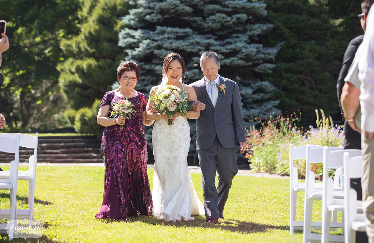 Bride enters ceremony at Berkshire Botanical Garden.